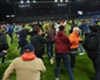 Aston Villa supporters rush the pitch
