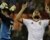 Valencia striker Paco Alcacer celebrates Deportivo goal