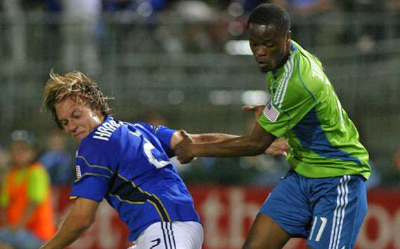 Steve Zakuani, Seattle Sounders FC; Michael Harrington, Kansas City Wizards; MLS (Getty Images)