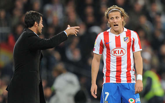 Atletico Madrid's Diego Forlan and Quique Sanchez Flores struggle to come to terms with a 4-1 pounding by Hercules (Getty Images)