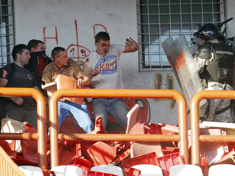 Belgrade derby marred by fan riots