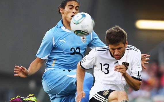 Germany - Uruguay, Thomas Mueller and Martin Caceres
