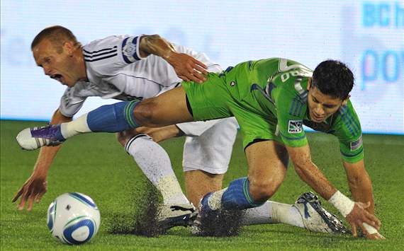Jay DeMerit, Vancouver Whitecaps; Fredy Montero, Seattle Sounders