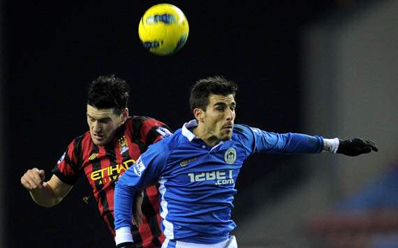 EPL - Wigan Athletic vs Manchester City,Jordi Gomez & Gareth Barry