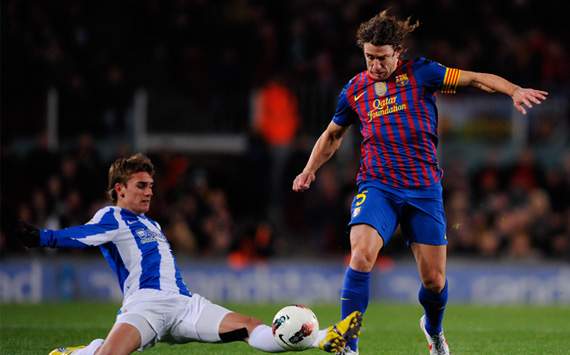 Carles Puyol; Antoine Griezmann en el FC Barcelona-Real Sociedad de la Liga BBVA