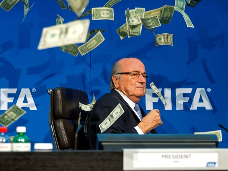 Comedian charged over Blatter money-throwing Fifa stunt