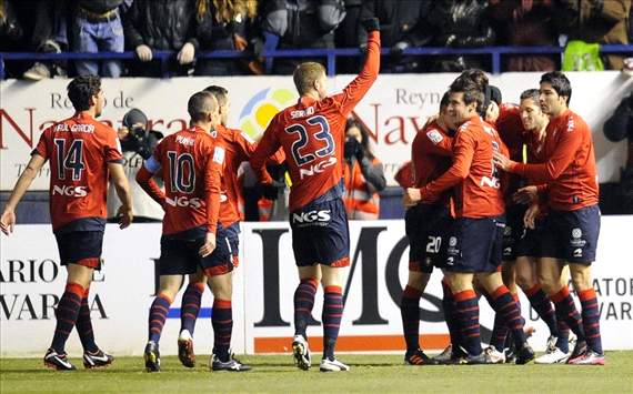 Osasuna players celebrate a goal