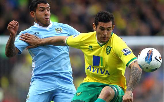 EPL - Norwich City v Manchester City, Bradley Johnson and Carlos Tevez