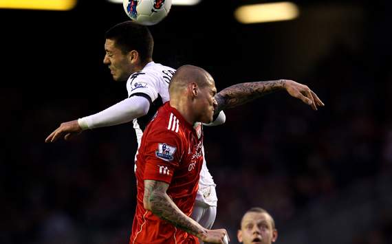 EPL - Liverpool v Fulham, Martin Skrtel and Clint Dempsey
