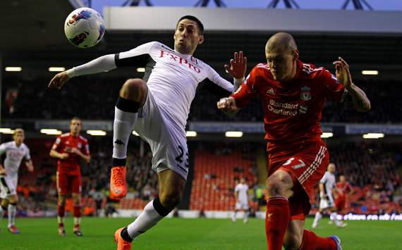 EPL - Liverpool v Fulham, Martin Skrtel and Clint Dempsey