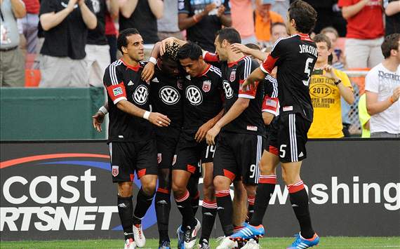 D.C. United celebrates against the New England Revolution, MLS