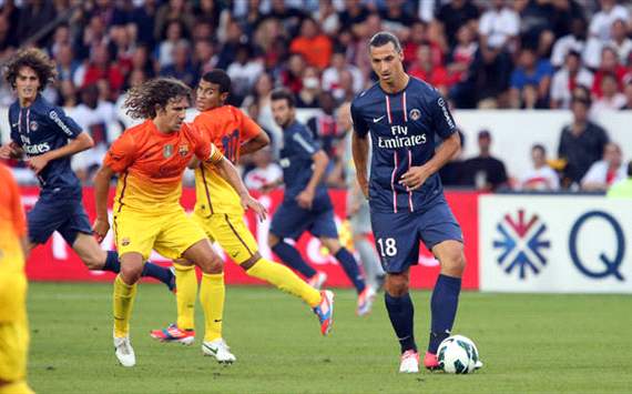 Carles Puyol and Zlatan Ibrahimovic during PSG-Barcelona match