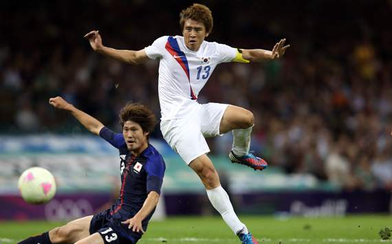 Olympics Day 14 - Men's Football, Korea v Japan, Jacheol Koo and Daisuke Suzuki