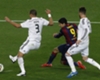 Barcelona attacker Luis Suarez takes on Sergio Ramos and Pepe