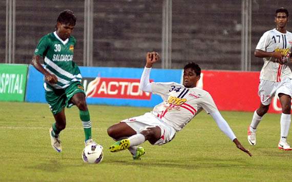 Pailan Arrows' D.Ganesh tackles Francis Fernandes of Salgaocar FC, I-League