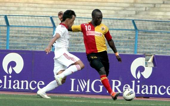 East Bengal's Edeh Chidi tries to get past Pune FC's Karma, I-League