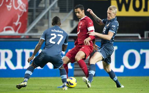 FC Twente - Feyenoord, Nacer Chadli met Ruben Schaken en Lex Immers