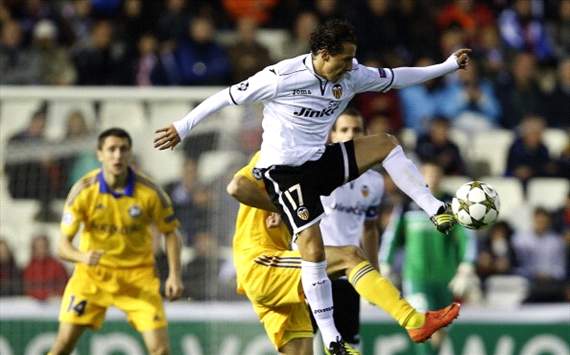 Bate Borisov's Denis Polyakov vies with Valencia's Jose Andres Guardado