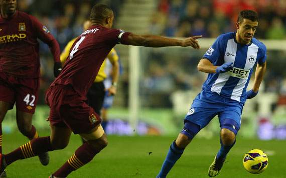 EPL - Wigan Athletic v Manchester City, Franco Di Santo and Vincent Kompany