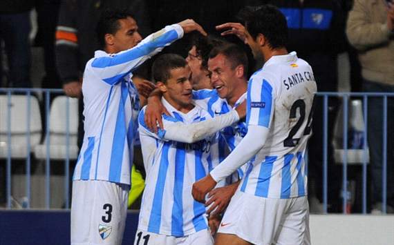 Malaga players celebrate