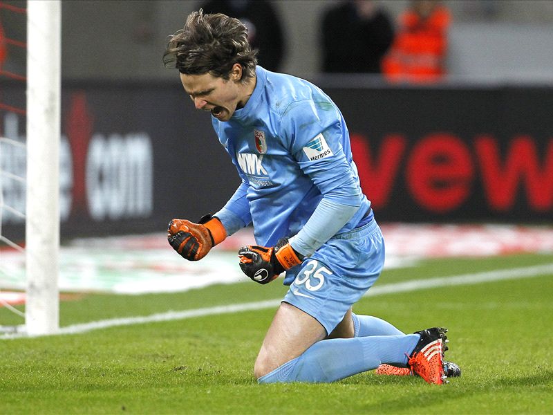Augsburg keeper apologises after tampering with penalty spot