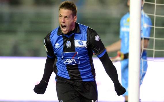 German Denis celebrates his goal against Parma