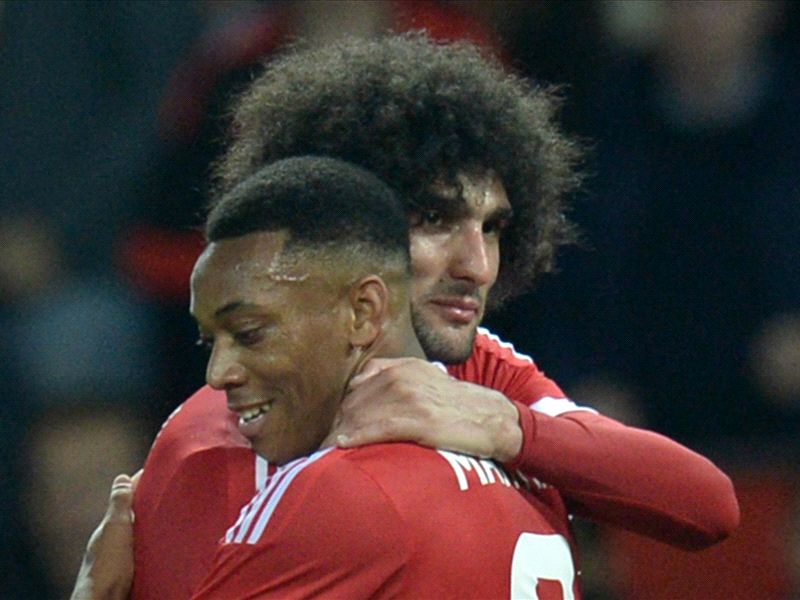 Fellaini and Martial deliver Christmas gifts