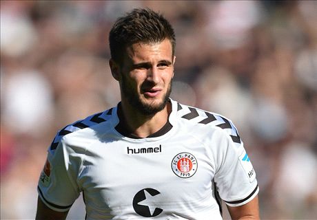 Striker stunned by Arsenal links