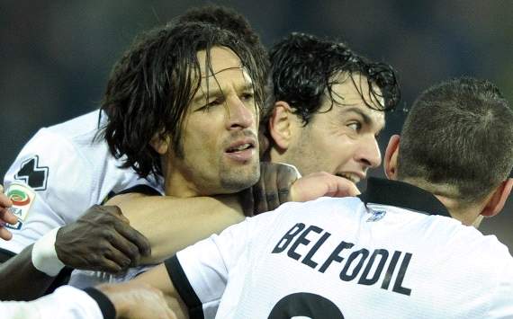 Parma players celebrate Amauri's goal against Palermo