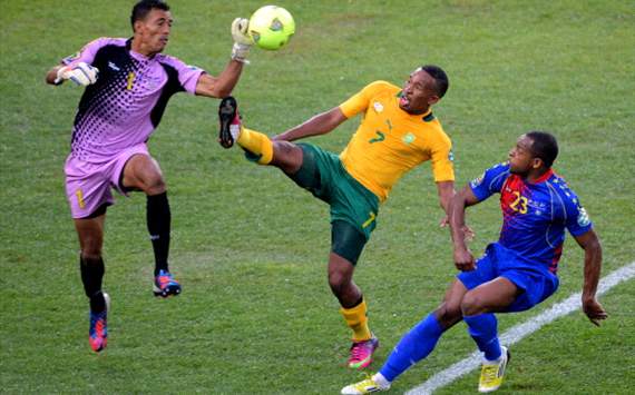 Lehlohonolo Majoro of South Africa in action against Dias Josimar and Tavares Calos of Cape Verde