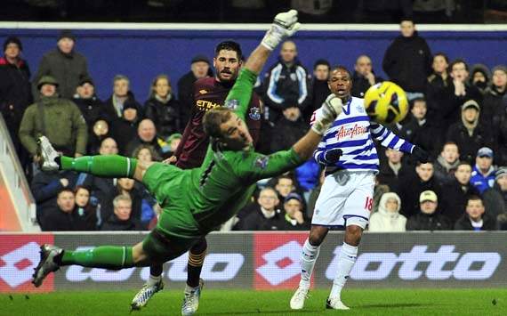 EPL, QPR v Manchester City, Loic Remy (R), Joe Hart (L)