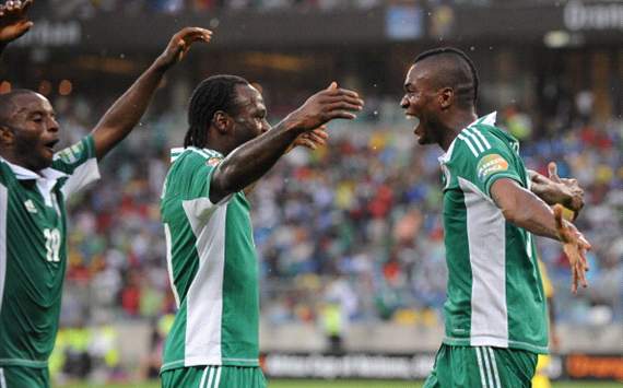 Ideye Brown celebrates with Victor Moses and Sunday Mba