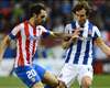 ESP, Atletico - Juanfran prolonge, Guilavogui débute