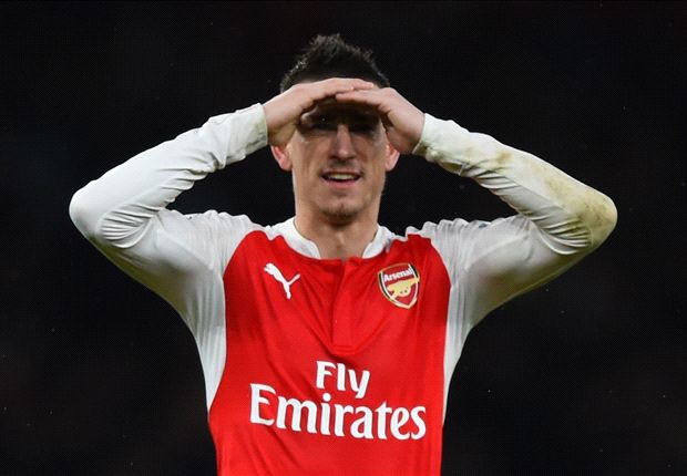 Petr Cech injures himself running up for a late corner against Swansea