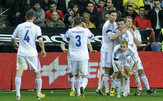 Finland celebrates against Spain