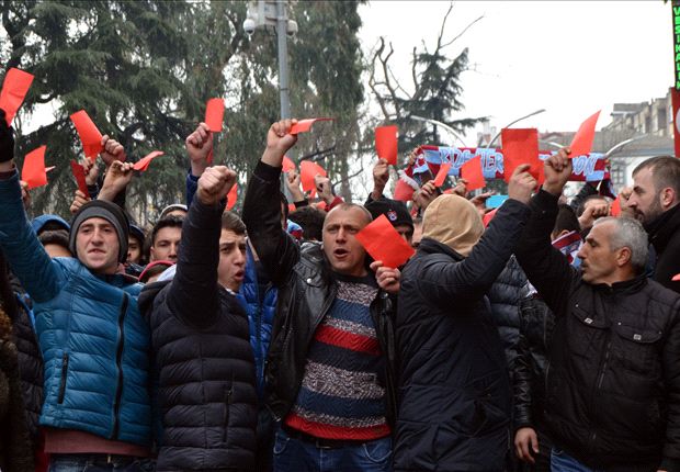 Trabzonspor fans protest red card decision... with red cards!