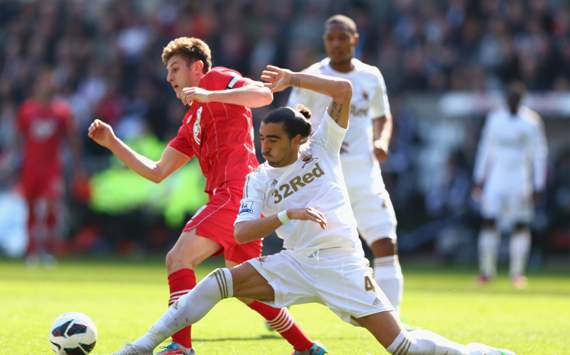 EPL - Swansea City v Southampton, Chico Flores and Adam Lallana
