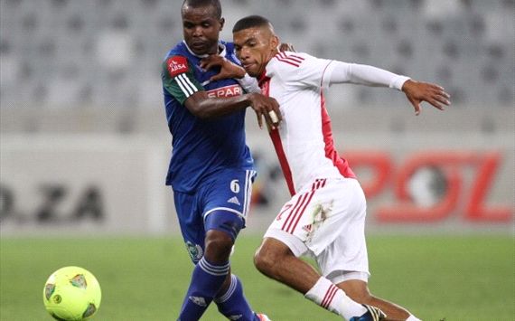Stanley Kgatla of Amazulu competes for the ball with Toriq Losper of Ajax Cape Town