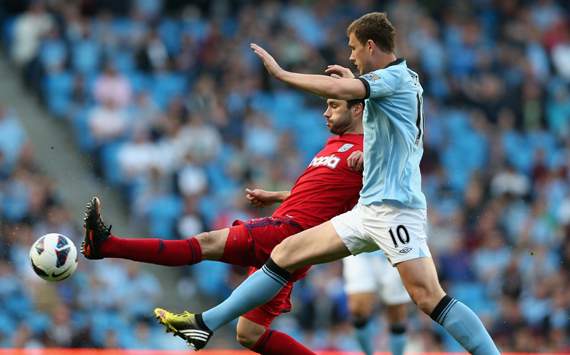 Claudio Yacob; Edin Dzeko