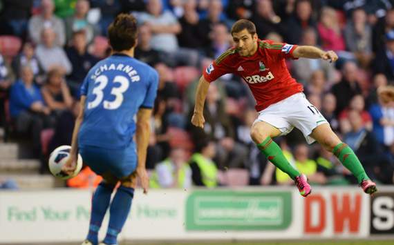 EPL - Wigan Athletic v Swansea City, Paul Scharner and Itay Shechter