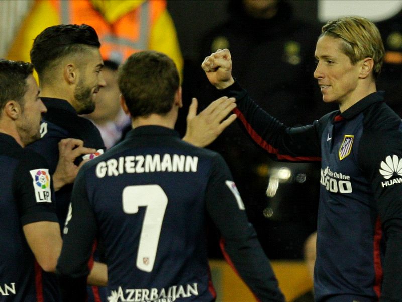 Valencia 1-3 Atletico: Torres on target as Neville's men falter