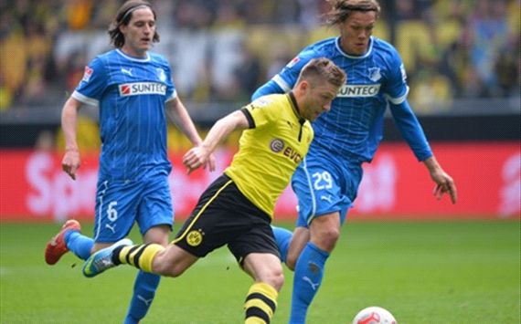Kuba of Dortmund is challenged by Jannik Verstergaard of Hoffenheim