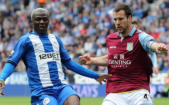 EPL - Wigan Athletic vs Aston Villa,Ron Vlaar & Arouna Kone