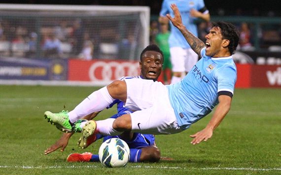 Mikel Obi vs Manchester City's Carlos Tevez