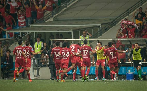 LionsXII players run to bench to celebrate
