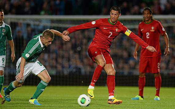 6 September 2013; Christano Ronaldo, Portugal, in action against Steven Davis, Northern Ireland. 2014 FIFA World Cup Qualifier, Group F, Northern Ireland v Portugal, Windsor Park, Belfast