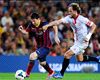 Lionel Messi of FC Barcelona duels for the ball with Ivan Rakitic of Sevilla FC Lionel Messi of FC Barcelona duels for the ball with Ivan Rakitic of Sevilla FC