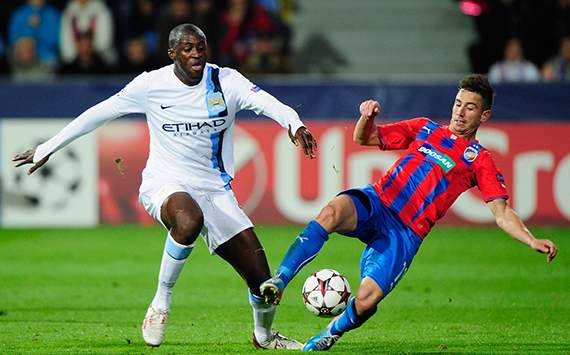 Yaya Toure and Milan Petrzela, FC Viktoria Plzen v Manchester City - Champions League