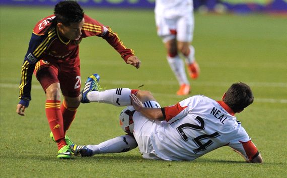 Lewis Neal of D.C. United tackles the ball away from Sebastian Velasquez of Real Salt Lake