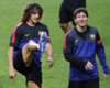 Barcelona's Carles Puyol and Lionel Messi in training